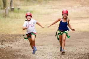 A WaldoCamp photo shared with 2 campers skipping along a dirt path.