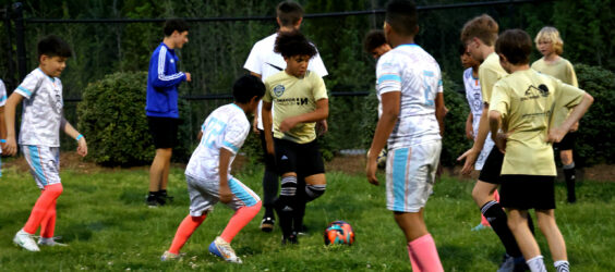 youth sports leagues children playing soccer
